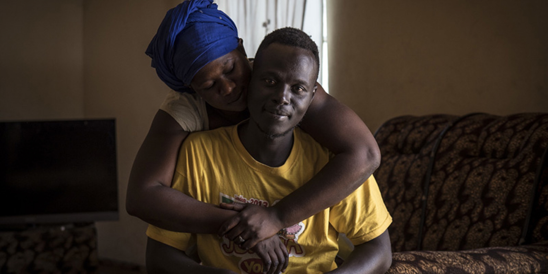 Returnee with his wife, courtesy of Jason Florio